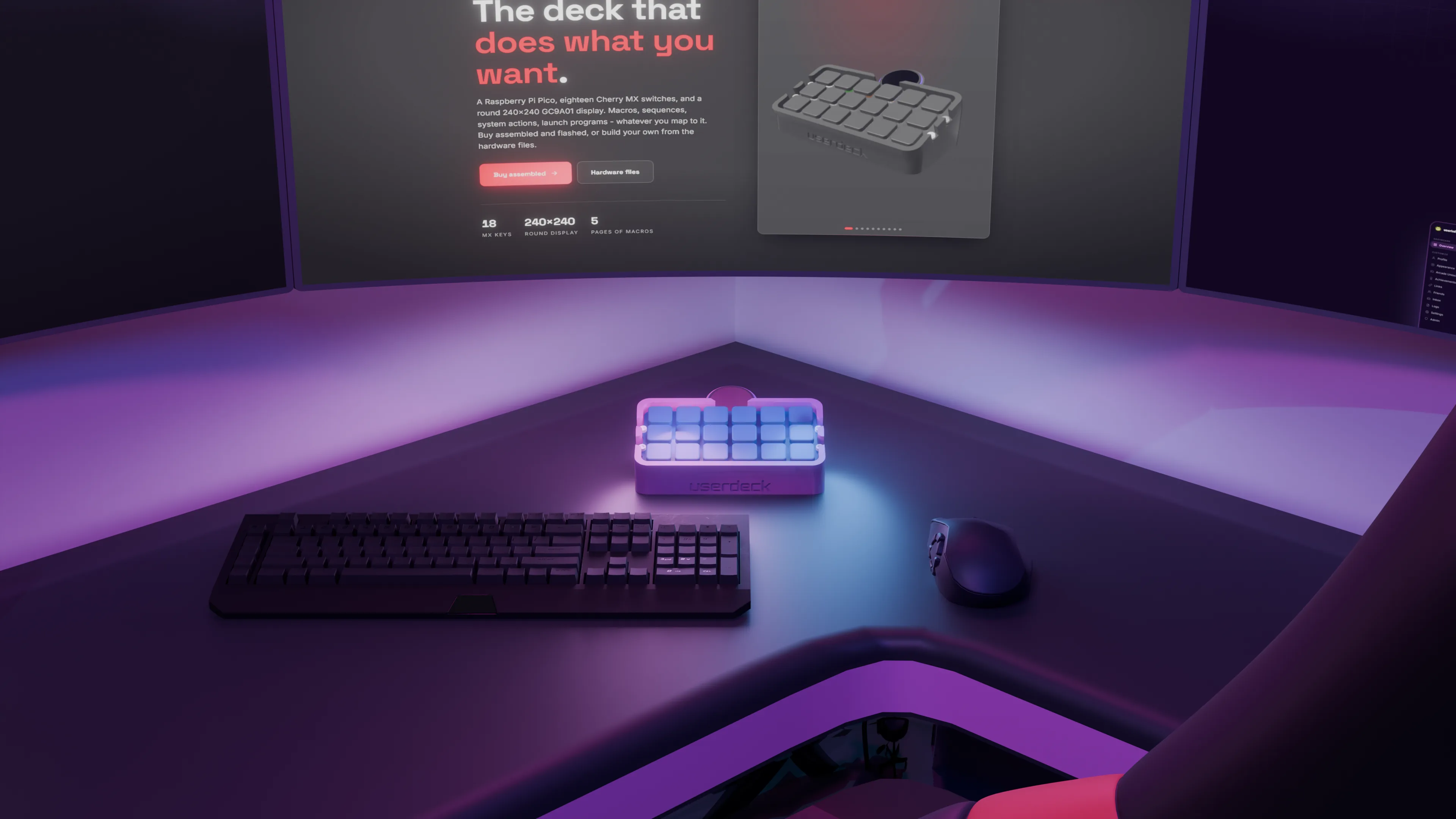 The userdeck on a desk with the website on the monitor behind it